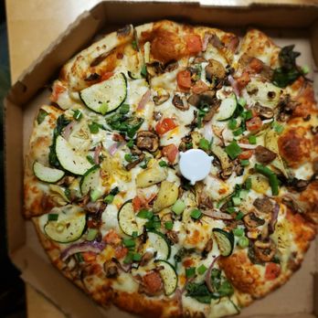 Round Table Pizza - Veggie is the bomb with zucchini and artichokes - Pizza Near Me - Las Vegas, Nevada Round Table Pizza - Veggie is the bomb with zucchini and artichokes - Pizza Near Me - Las Vegas, Nevada