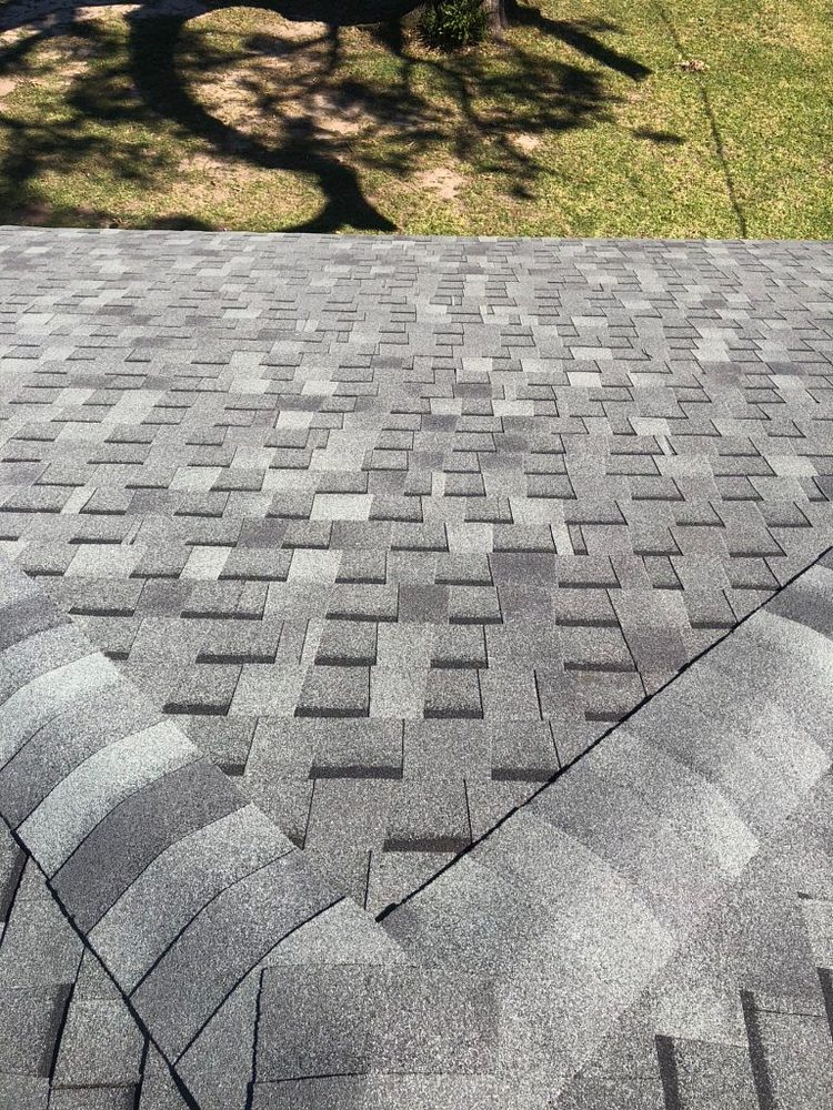 Slide of Pelican Roofing Company