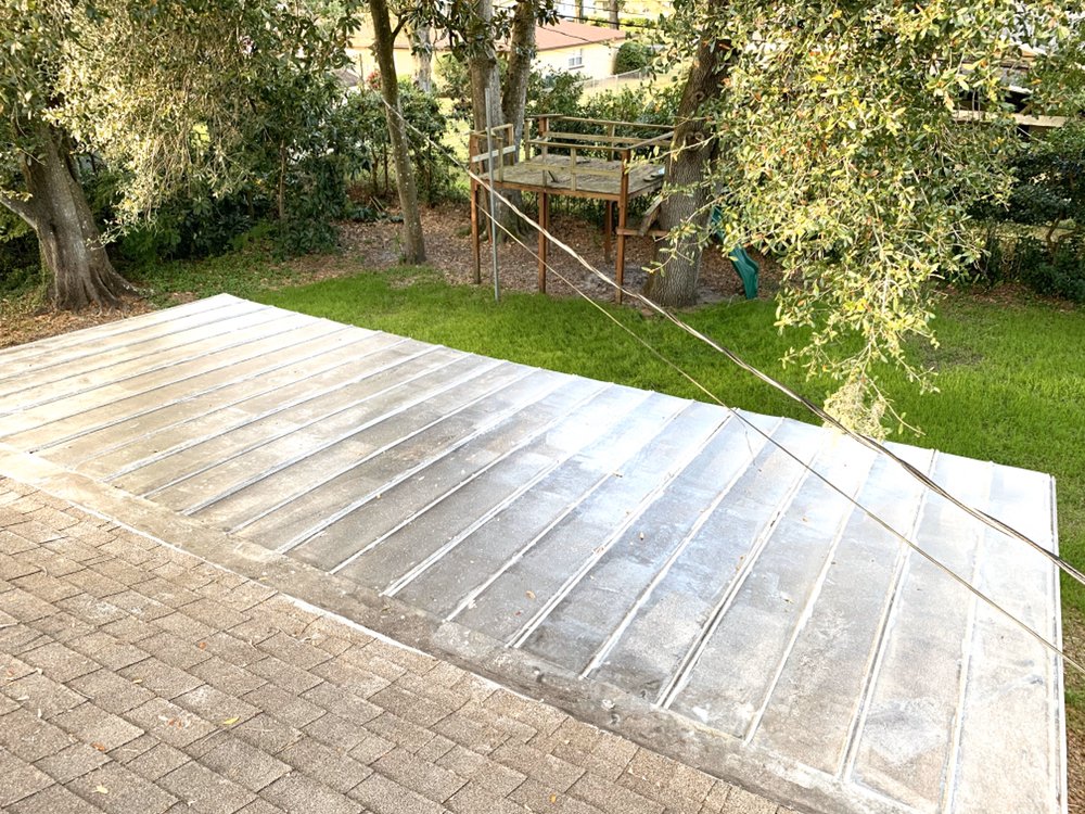 Slide of Firestone Roofing Services