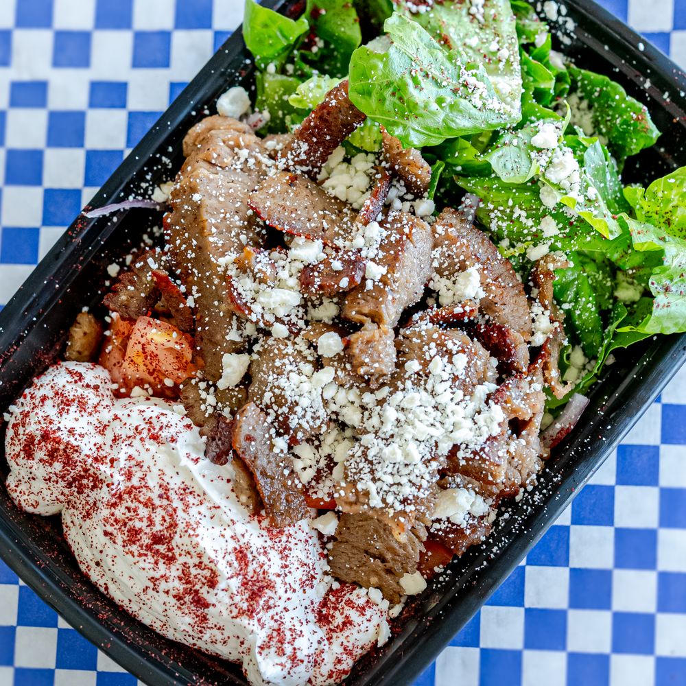 Grapeleaf Mediterranean Grille Logo