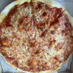Sinibaldi's Restaurant - Small cheese pizza. Thin crust with a unique but amazing flavor, delicious. Crust edges were nice and crunchy.