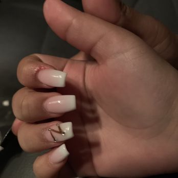 Ravenna Nail Spa - She wanted calligraphy z she got this !! And cuticle damaged!! - Nail Salons Near Me - Geneva, Illinois Ravenna Nail Spa - She wanted calligraphy z she got this !! And cuticle damaged!! - Nail Salons Near Me - Geneva, Illinois