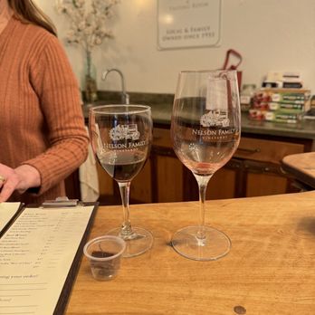 Nelson Family Vineyards - two glasses of wine and a menu - Wineries Near Me - Ukiah, California Nelson Family Vineyards - two glasses of wine and a menu - Wineries Near Me - Ukiah, California