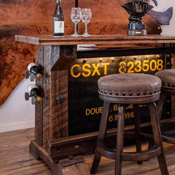 Buffalo Collection - Close-up of a vintage wine table and buffalo leather bar stools from Buffalo Collection in Old Town Scottsdale, AZ - Home Decor Near Me - Scottsdale, Arizona Buffalo Collection - Close-up of a vintage wine table and buffalo leather bar stools from Buffalo Collection in Old Town Scottsdale, AZ - Home Decor Near Me - Scottsdale, Arizona