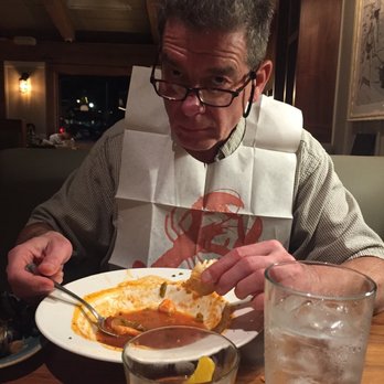 Bluewater Grill Seafood Restaurant & Market Carlsbad - My husband loving the  cioppino and the  Bread - Seafood Near Me - Carlsbad, California