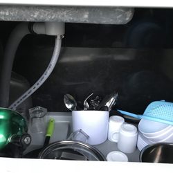 JUCY Rentals - Queenstown Airport - June 2018 - our Jucy camper van! Kitchen - pots, pans, cups, utensils, etc.