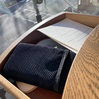Hide - Phone charger located in a drawer in the table - French Near Me - London, XGL