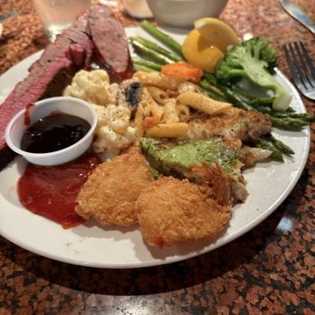 Freda's Seafood Grille - Tilapia, brisket, mac and cheese, seafood pasta, asparagus, - Seafood Near Me - Austin, Texas