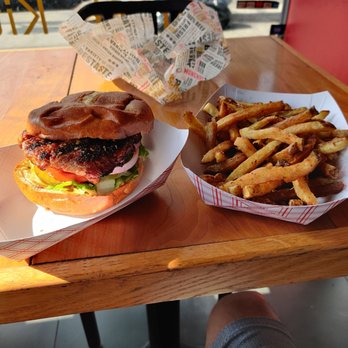 Joseph dream Burger - a burger and fries on a table - Burgers Near Me - Brooklyn, New York Joseph dream Burger - a burger and fries on a table - Burgers Near Me - Brooklyn, New York