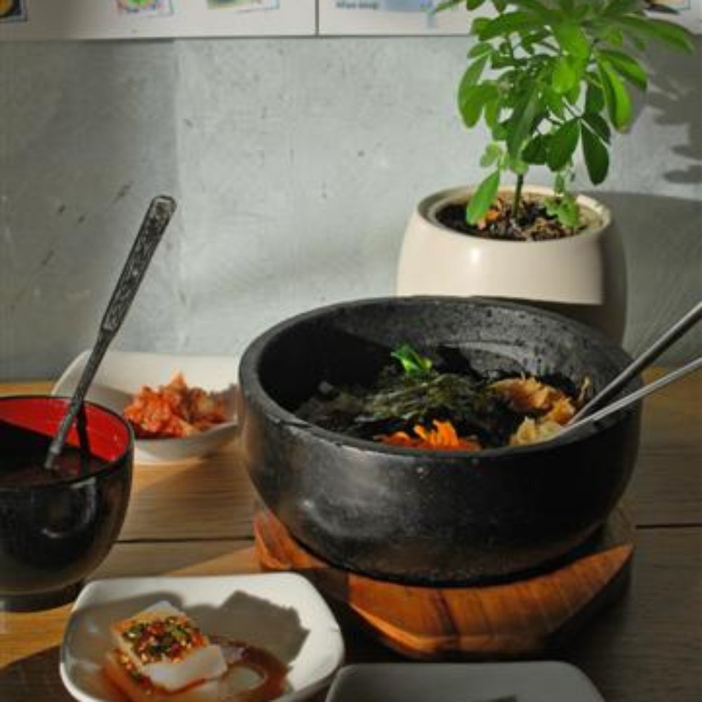 The £7.50 vegetarian bibimbap meal with sides of miso, kimchi and cucumber. The £7.50 vegetarian bibimbap meal with sides of miso, kimchi and cucumber.