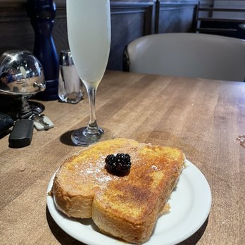 Twelve Kitchen + Cocktails - I already attacked it at brunch... this solitary one is waiting on a to go box while I finish my amazingly delicious drink, Seaside. - New American Near Me - Tyler, Texas