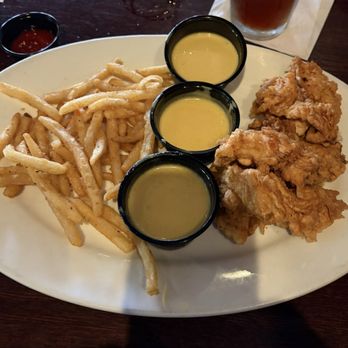 Sam's Place - Chicken tenders and fries. Portions keep shrinking, but still tastes great. - Sports Bars Near Me - Nashville, Tennessee Sam's Place - Chicken tenders and fries. Portions keep shrinking, but still tastes great. - Sports Bars Near Me - Nashville, Tennessee