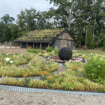 Sylvan Table - Flower beds and barn - New American Near Me - Sylvan Lake, Michigan Sylvan Table - Flower beds and barn - New American Near Me - Sylvan Lake, Michigan