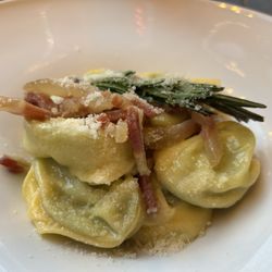 Enoteca del Duomo - Tortellone in traditional capon stock and quick seared strips of guanciale