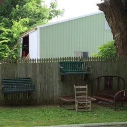 The Garden Patch - Up against the fence are these chairs and 2-seaters.