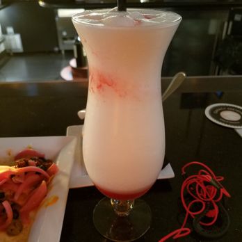 Lighthouse Restaurant - Volcano, taste like a pina colada mostly. - New American Near Me - Canyon Lake, California