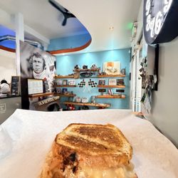Shift Coffee House - Hot as Hell grilled chicken, mango habanero hot sauce, jalapeño jack, on grilled french bread