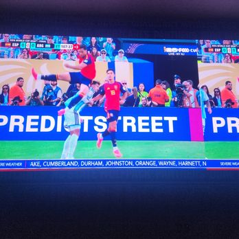 Dave & Buster's Cary - seated way too close to the TVs - Sports Bars Near Me - Cary, North Carolina