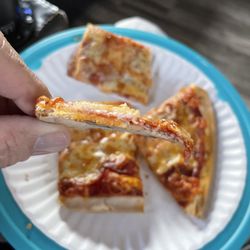 Luigi's Pizza - Thin crust, good.