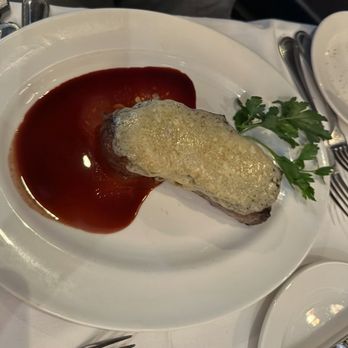 The Capital Grille - Gorgonzola-Crusted Dry Aged NY/KC Strip with Cabernet Reduction - Steakhouses Near Me - Charlotte, North Carolina The Capital Grille - Gorgonzola-Crusted Dry Aged NY/KC Strip with Cabernet Reduction - Steakhouses Near Me - Charlotte, North Carolina