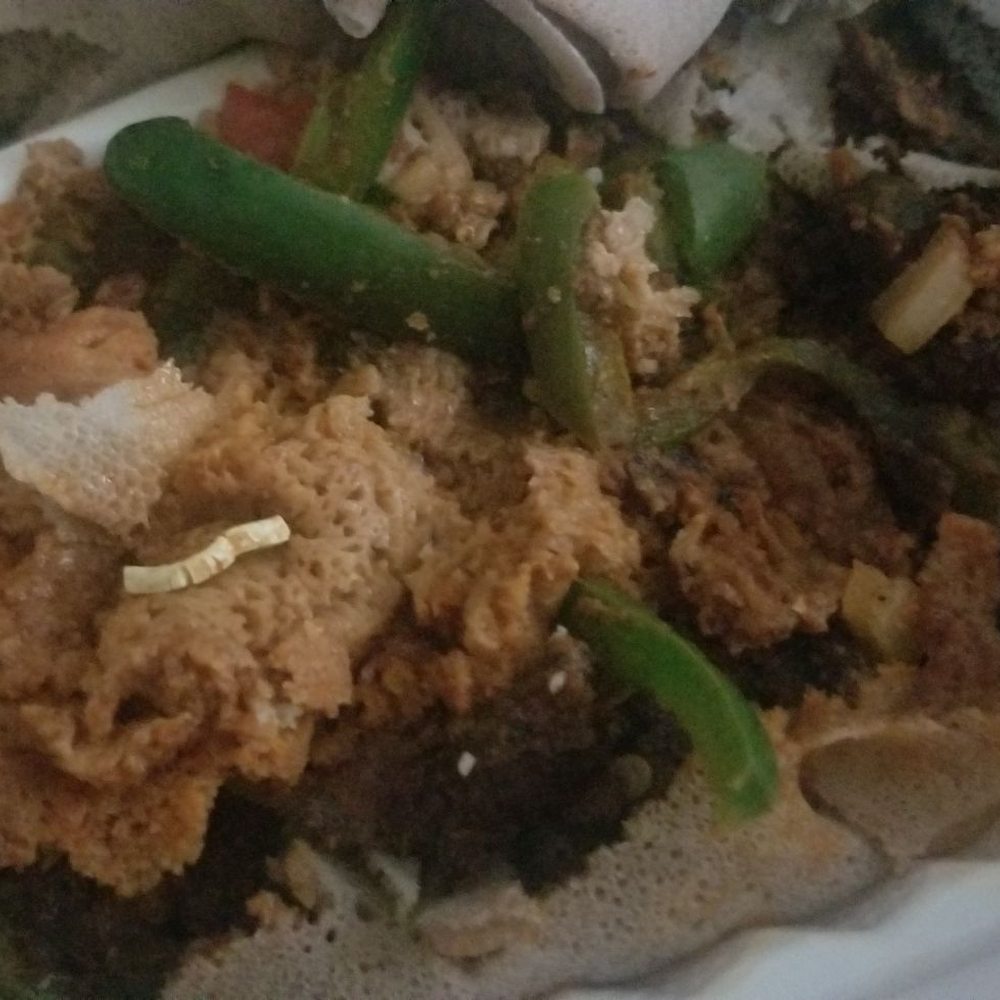 Langano Ethiopian Restaurant - I found this white thing in the food. It is hard nd hurts... this my first time ordering, nd it will be my last. Disappointed. - Ethiopian Near Me - Silver Spring, Maryland