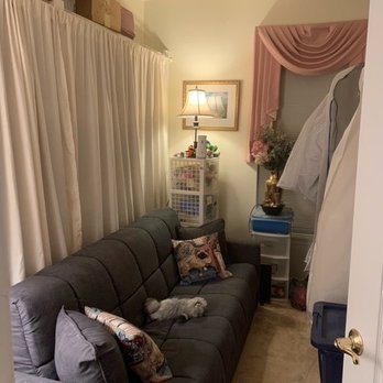 POP Organizing - AFTER - plastic totes are hidden on shelves behind the curtain - Hard to believe this is the same room! - Home Organization Near Me - Arlington, Virginia