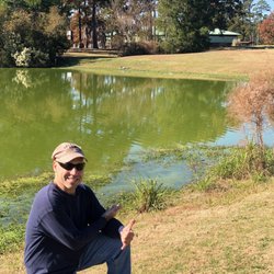Taylors Creek Golf Course - What alligator? Oh yeah... but it's a small one and on the other bank