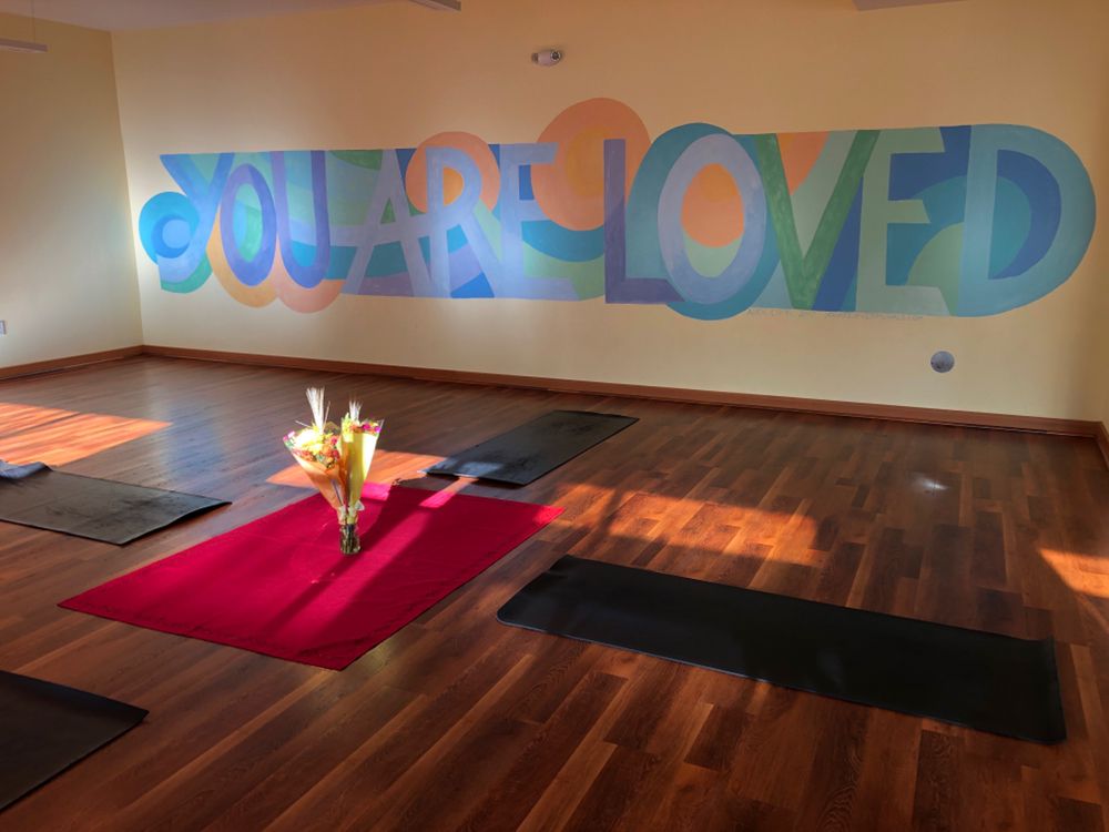 4 Corners Yoga + Wellness Logo