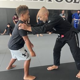 Noah getting a lesson from owner Amir