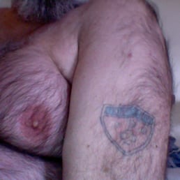 one of my tats mic'c guys did It was done a very long time ago but has held up nice