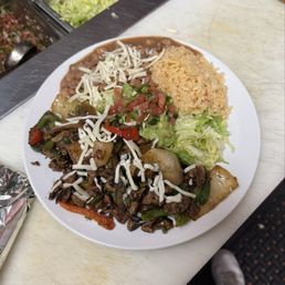 Road runner carne asada bowl with pinto beans Road runner carne asada bowl with pinto beans