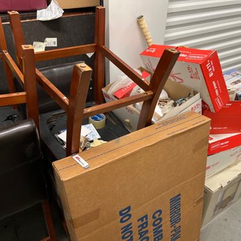 Junk Squad - Boxes and chairs that dry rotted on the bottom - Junk Removal & Hauling Near Me
