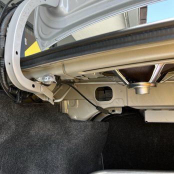 Car Audio One - The wires for my backup camera neatly threaded through my trunk's hinge. - Auto Parts & Supplies Near Me - Chula Vista, California