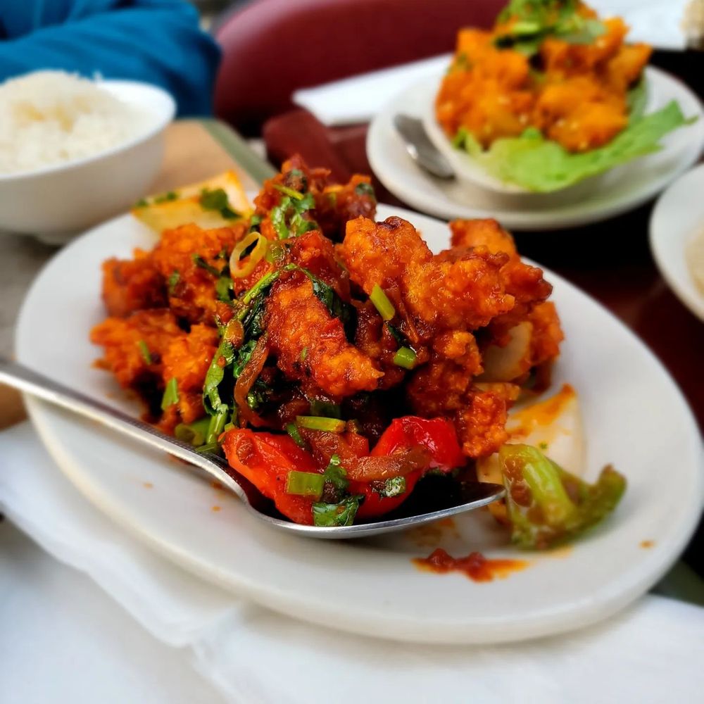 Cafe Himalaya - Chili Chicken w/onions & bell peppers in spicy tomato sauce w/rice. Fantastic. - Himalayan/Nepalese Near Me - New York, New York Cafe Himalaya - Chili Chicken w/onions & bell peppers in spicy tomato sauce w/rice. Fantastic. - Himalayan/Nepalese Near Me - New York, New York