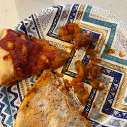 Aurelio's Pizza - Soggy undercooked pizza