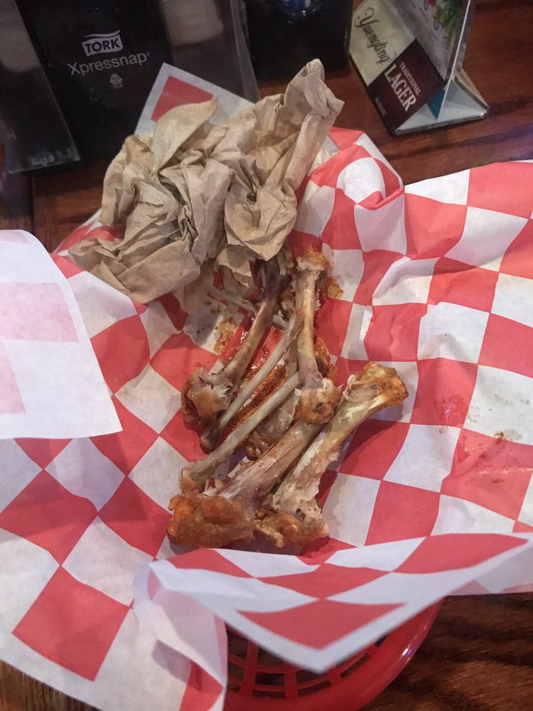 Wing bones after I finished with them. Yelp