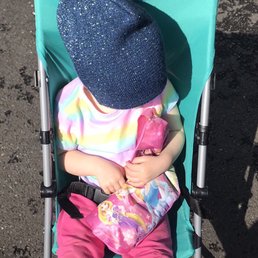 My toddler in Cosco Umbrella Stroller with adjustable Canopy in the color Teal I purchased, folds up easy for storage!