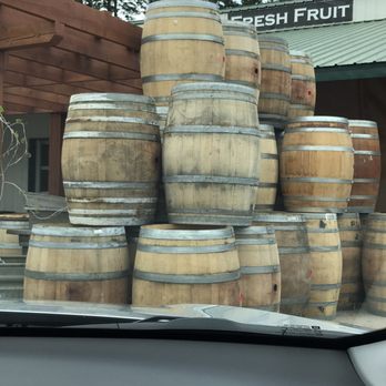Glacier Sun Winery & Tasting Room - Outside barrels - Wineries Near Me - Kalispell, Montana