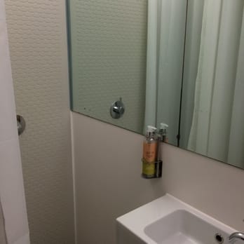 Yotel - Shower and sink - Hotels Near Me - Hounslow, XGL Yotel - Shower and sink - Hotels Near Me - Hounslow, XGL