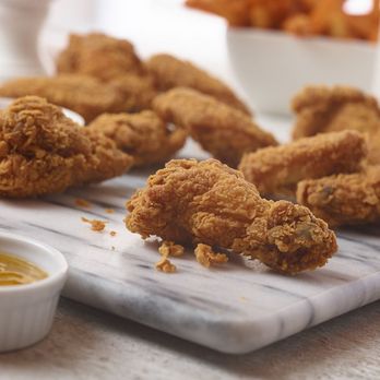 Quik Chik - fried chicken on a cutting board with dipping sauce - Fast Food Near Me - Hamilton, Ontario Quik Chik - fried chicken on a cutting board with dipping sauce - Fast Food Near Me - Hamilton, Ontario