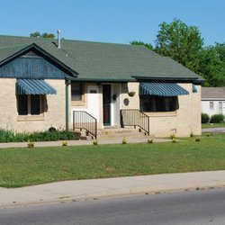 Intuitive Massage Therapy and Bodywork - View from Jenny Lind Road. Parking is on the South side of the property (left side). Mark's Laundromat is on the right and Pho Minh is left.