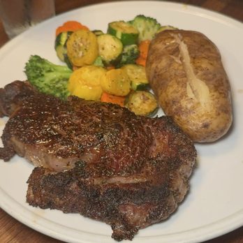 Stubrik's Steakhouse - 16oz Ribeye , Mixed Veggies, Baked Potato - Steakhouses Near Me - Fullerton, California Stubrik's Steakhouse - 16oz Ribeye , Mixed Veggies, Baked Potato - Steakhouses Near Me - Fullerton, California