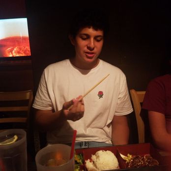 SUSHIRAW - My friend enjoying his sushi - Japanese Near Me - Granada Hills, California