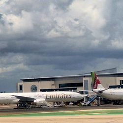Aeroporto de Lisboa - The north T1 addition is newer and more suited to handle heavies flying long-haul. The big Emirates B777 next to TAP's A330-900 makes sense.