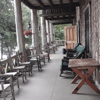 Covewood Lodge - Front Porch. - Hotels Near Me - Eagle Bay, New York Covewood Lodge - Front Porch. - Hotels Near Me - Eagle Bay, New York