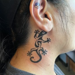 Gecko and pokeball tattoo Gecko and pokeball tattoo