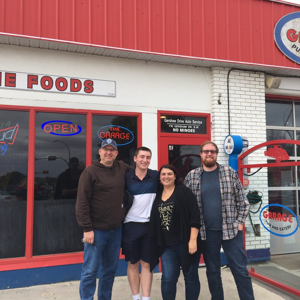 The Garage Pub & Eatery - three people standing outside - Burgers Near Me - Medicine Hat, Alberta The Garage Pub & Eatery - three people standing outside - Burgers Near Me - Medicine Hat, Alberta