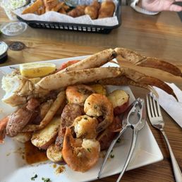 Cajun Crab leg, shrimp boil with sausage, potatoes and corn.