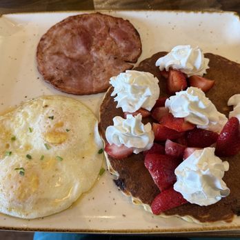 First Watch - Eggs, Smoked Ham, wheat pancake with strawberries and whipped cream. - Breakfast & Brunch Near Me - Winter Haven, Florida