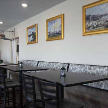 Queen Anne's Revenge - tables and chairs in a restaurant - Pizza Near Me - Beaufort, North Carolina Queen Anne's Revenge - tables and chairs in a restaurant - Pizza Near Me - Beaufort, North Carolina